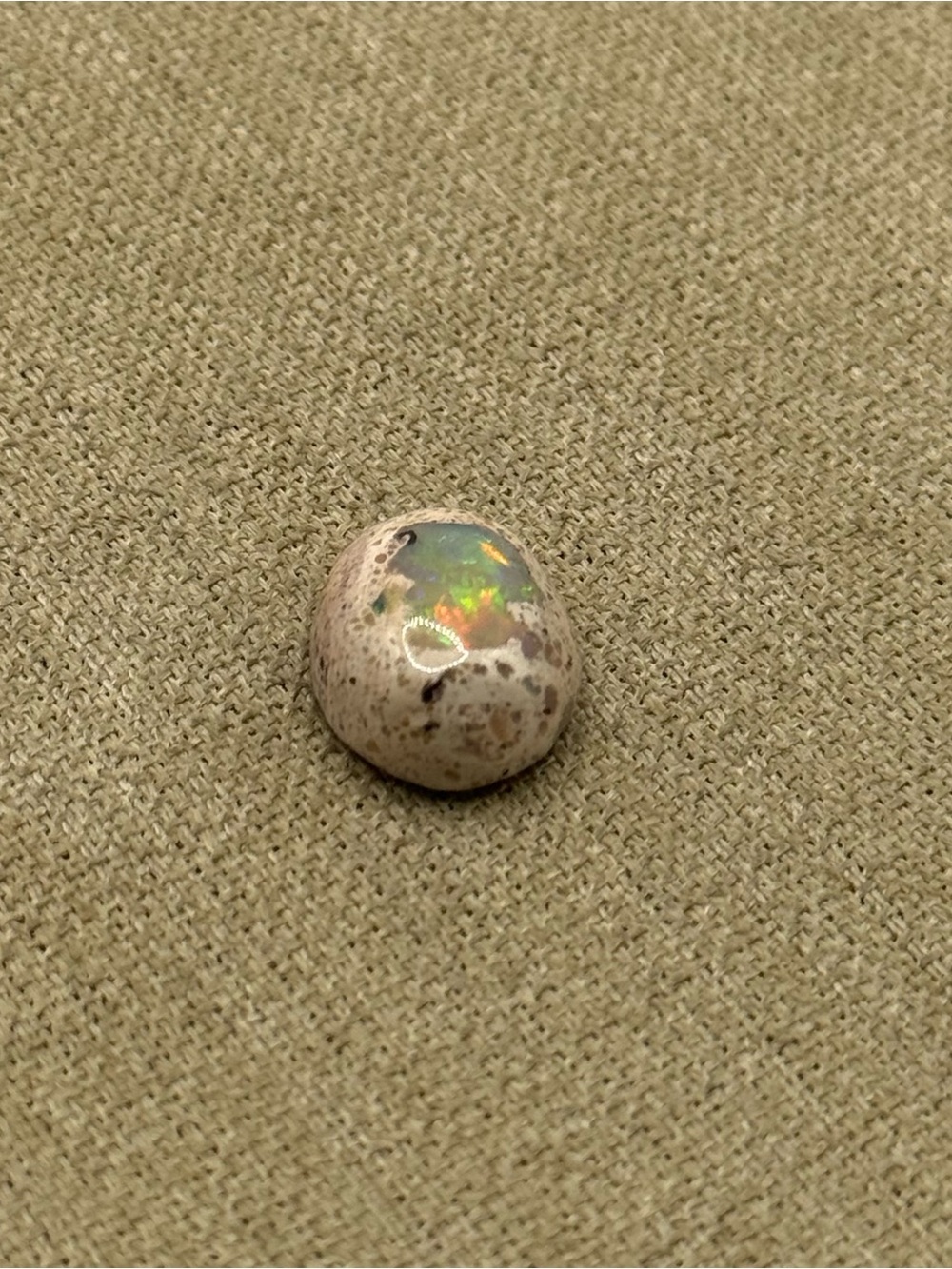 Polished Mexican matrix opal cabochon